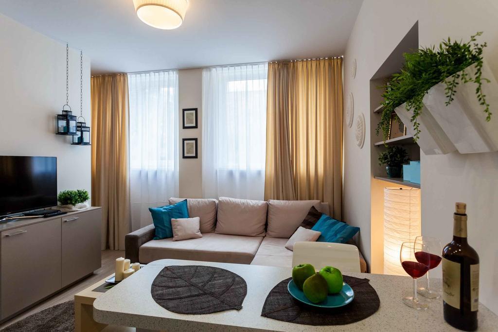 Raugyklos Apartamentai Vilnius Ruang foto